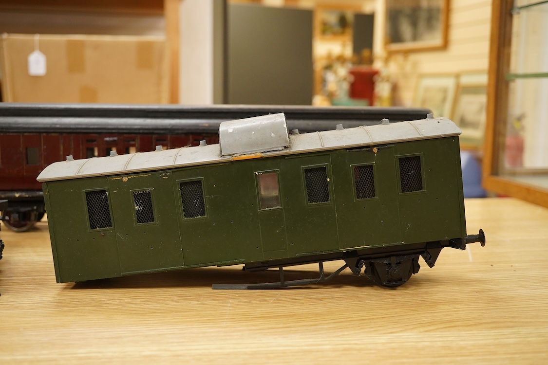 Two Gauge One bogie coaches; a Midland Railway clerestory coach, together with a 12-wheel Pullman car (bogies af), plus an American outline caboose, some scratch building and adaptation from kits, etc.